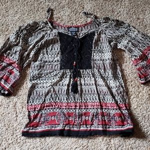 Cold shoulder long sleeve shirt.